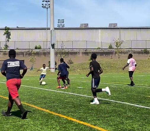 Warriors Soccer Camp group training session